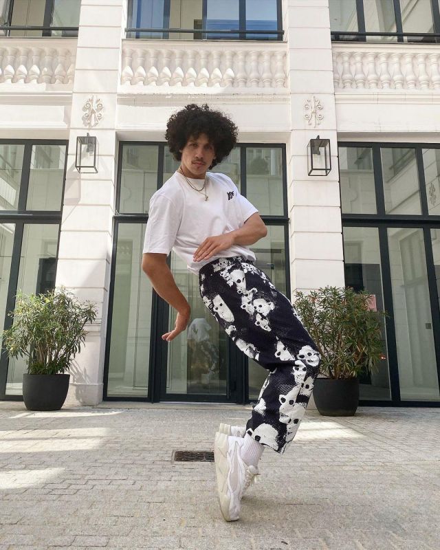The black pants with printed white faces worn by Rilès on his account Instagram @0riles