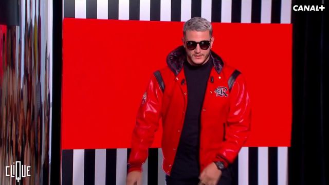 La veste rouge H. Robertson portée par DJ Snake dans l'émission Clique