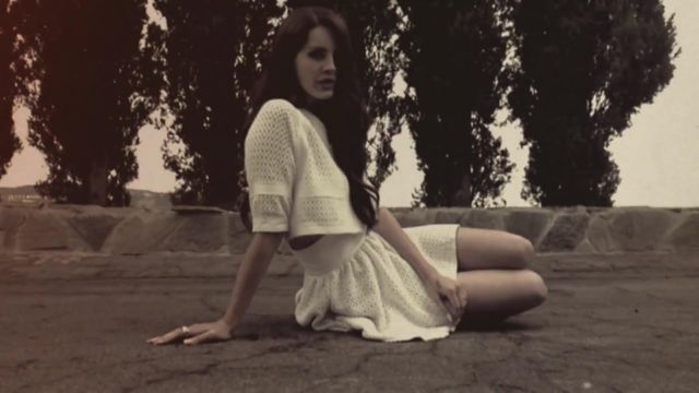 The white robe two-piece lace Lana Del Rey in her video clip Summertime Sadness