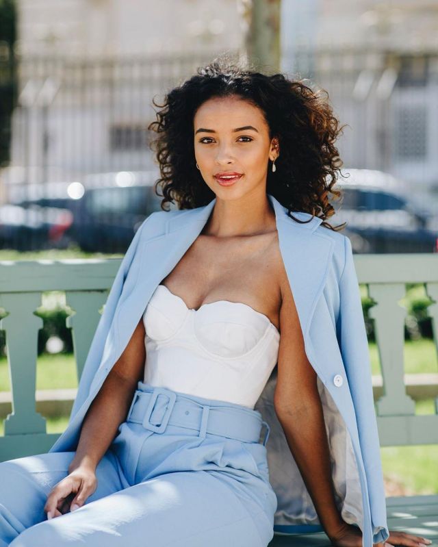 The jacket's loose-fitting pastel blue, Flora Coquerel on her account Instagram @floracoquerel