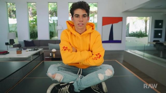Yellow all in hoodie worn by Cameron Boyce in Cameron Boyce Plays RAW's This or That
