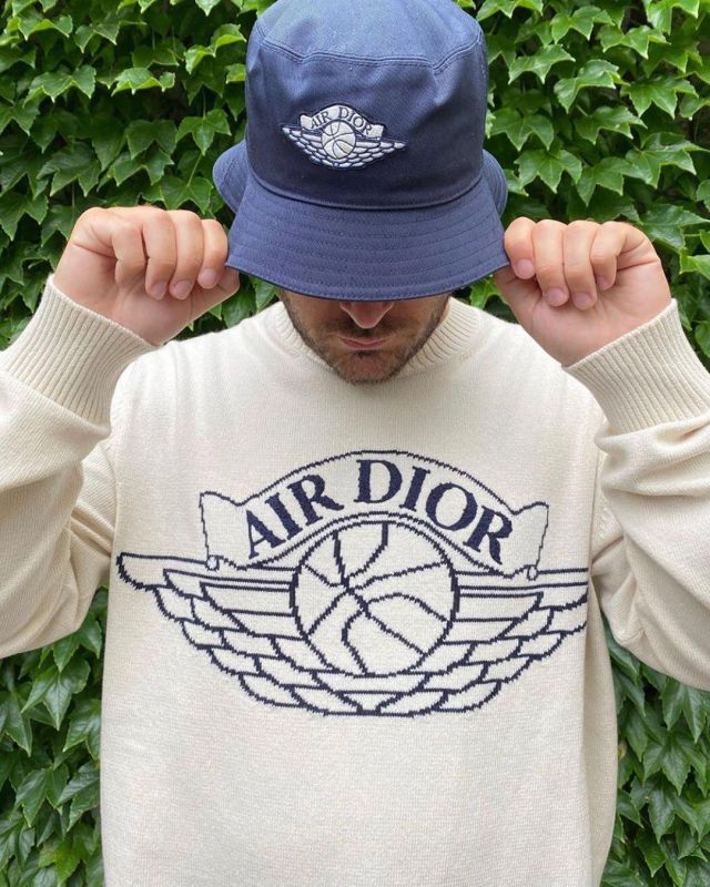 Dior x Jordan Wings Bucket Hat Navy on the account Instagram of @stockxstreetwear