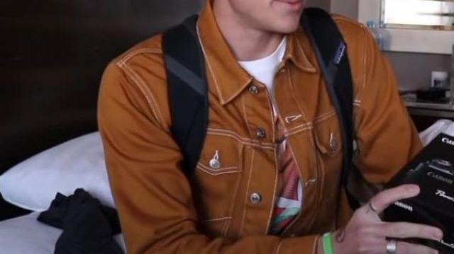 Mustard Jacket With White Stitching on Owen Joyner
