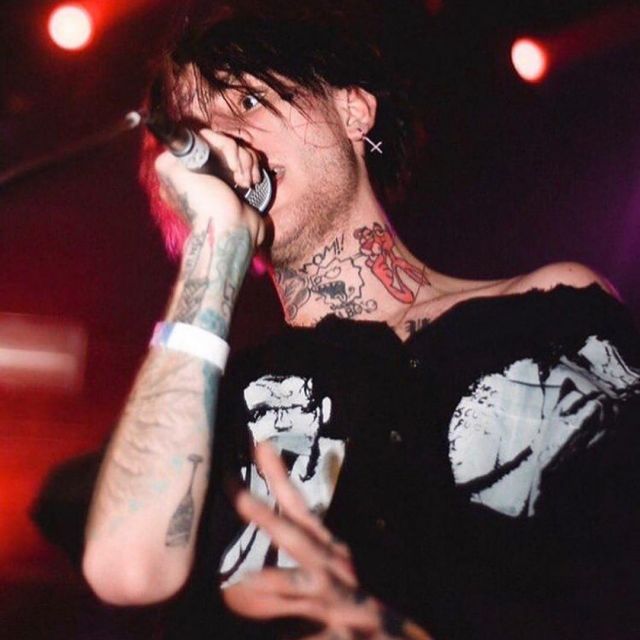 Ripped white and black shirt  worn by Lil Peep on the Instagram account of @gothboy__lilpeep