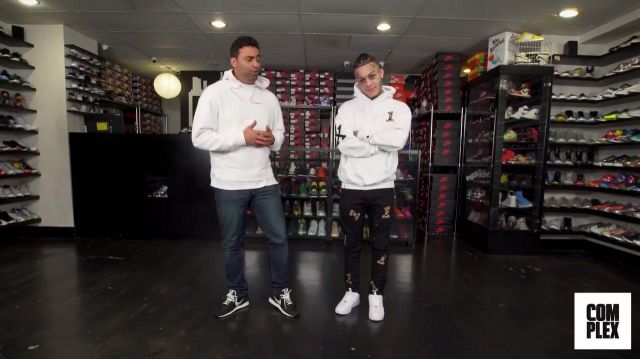 The hoodie white Champion worn by Lil Skies in the video Lil Skies Goes Sneaker Shopping With Complex