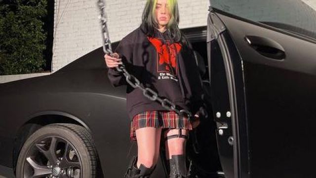 Dolls Kill Ob­sid­i­an Pock­et Com­bat Boots worn by Billie Eilish on the Instagram account of @Blohsh