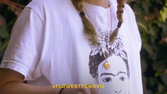 White Frida Callo T-shirt worn by Erika (Zoey Deutch) in Flower