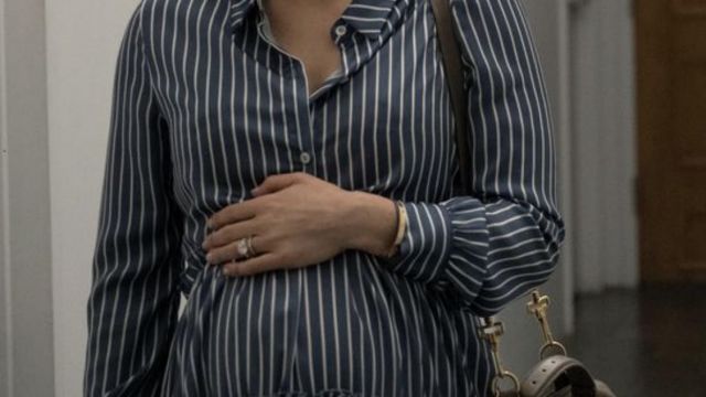 Blue tiered shirt dress of Lucy (Ilana Glazer) in False Positive