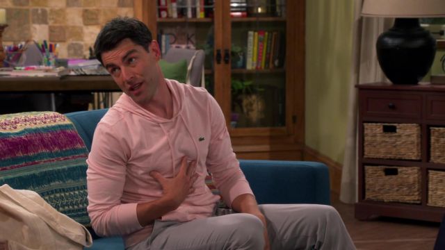 Lacoste Pink Hoodie worn by Dave (Max Greenfield) as seen in The Neighborhood (Season 4 Episode 1)