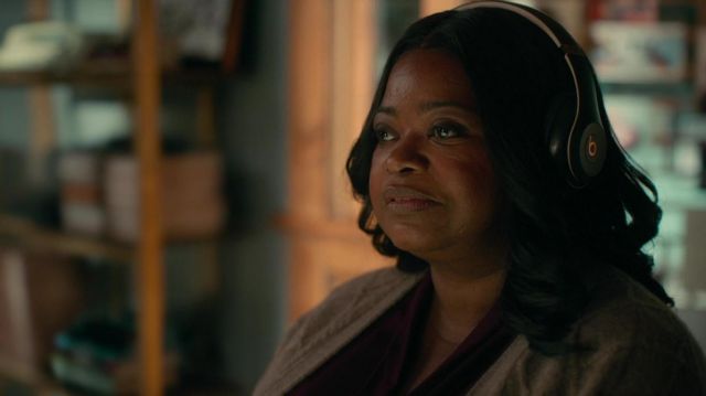 Beats Headphones in black used by Poppy Scoville-Parnell (Octavia Spencer) as seen in Truth Be Told Tv series (Season 2 Episode 8)