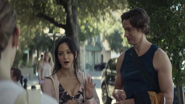 Beach Riot Bowie knotted cutout floral-print stretch sports bra worn by Kiki (Shannon Chan-Kent) as seen in You outfits (Season 3 Episode 1)
