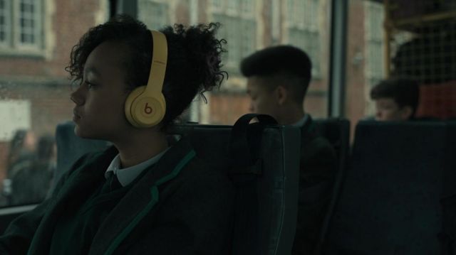 Beats Solo3 Headphones in yellow used by Jamila Huston (India Brown) as seen in Invasion TV show (S01E02)