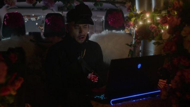 Alienware laptop used by Reggie (Ricky Norwood) as seen in The Princess Switch 3: Romancing the Star movie