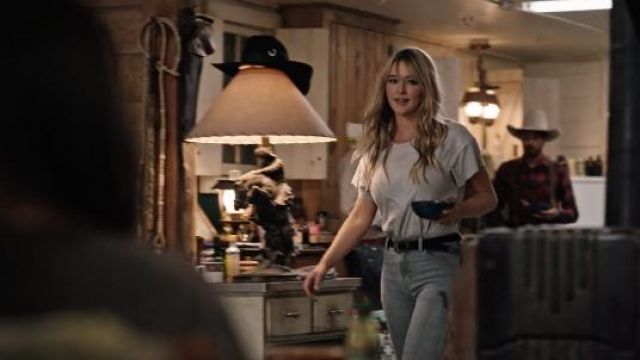 Wrangler Light Wash Denim Jeans worn by Laramie (Hassie Harrison) as seen in Yellowstone TV series outfits (Season 4 Episode 4)