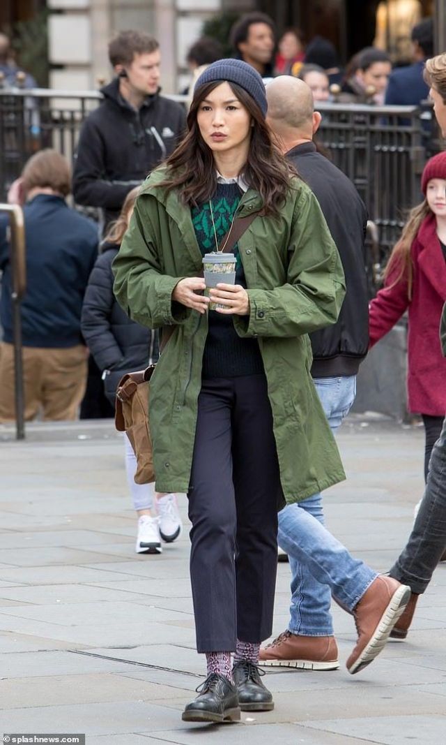 The sweater with green patterns Toast worn by Sersi (Gemma Chan) on the set of the movie The Eternals