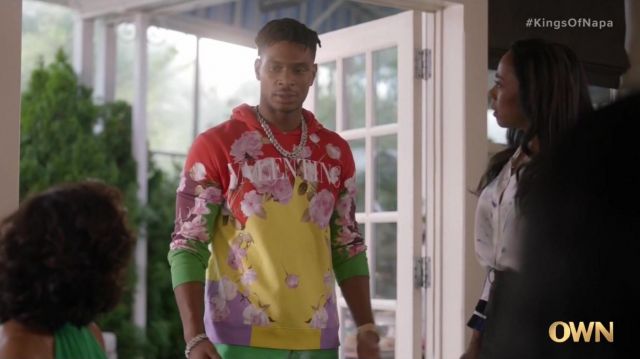 Valentino rose-print hoodie worn by Christian King (Ashlee Brian) as seen in The Kings of Napa TV series outfits (Season 1 Episode 1)