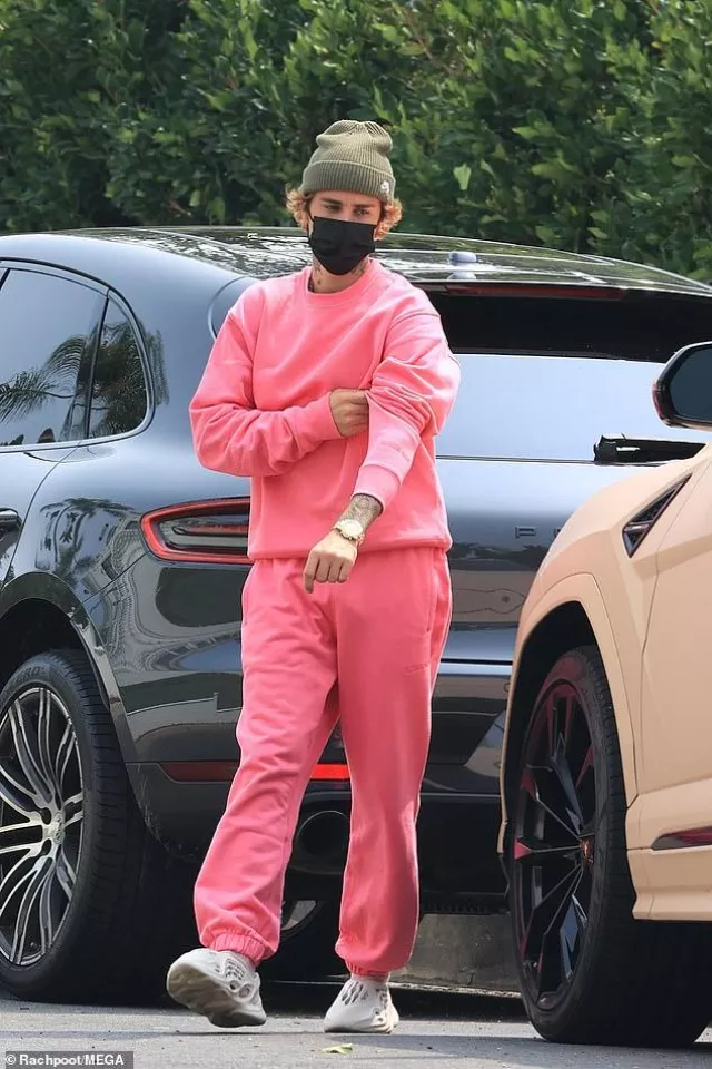 Hot Pink Track Sweater worn by Justin Bieber as he visits a friend with wife Hailey after celebrating their second wedding anniversary