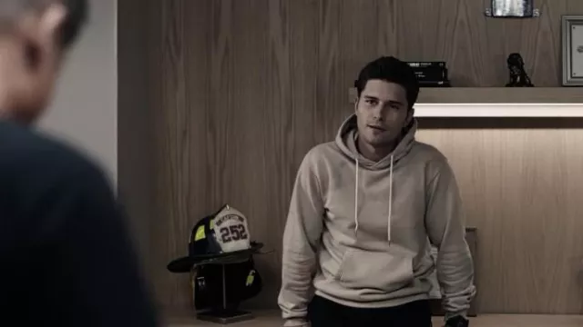 Beige hoodie with washed out paint streaks worn by T.K. Strand (Ronen Rubinstein) in 9-1-1: Lone Star (S01E09)