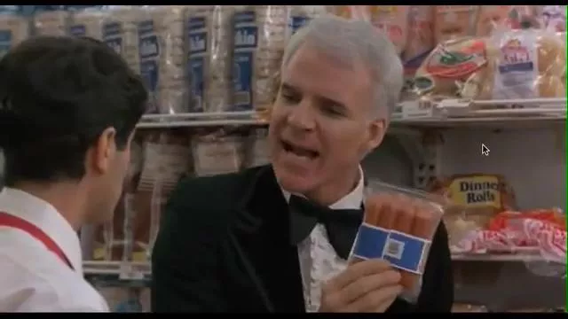 Hot dog sausages held by George Banks (Steve Martin) in Father of the Bride