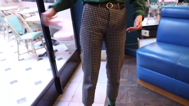 The plaid pants worn by Angèle in the video STREET STYLE — ANGÈLE by Madmoizelle