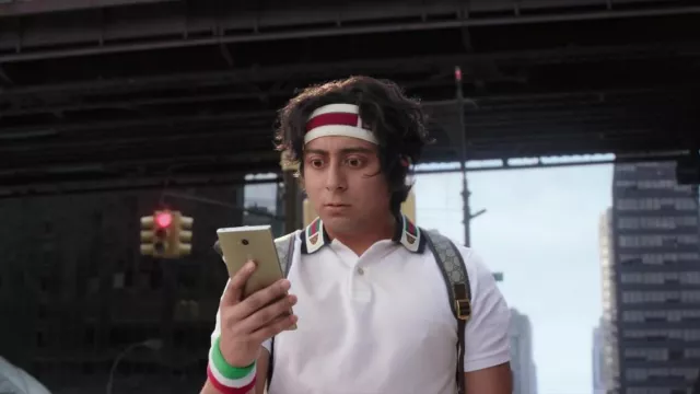 Gucci web-detail polo shirt in white worn by Flash Thompson (Tony Revolori) as seen in Spider-Man: No Way Home