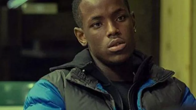 The North Face Blue and Black Puffer Jacket worn by Jamie (Micheal Ward) in Top Boy (Season 2 Episode 8)