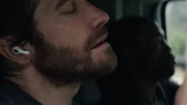 Apple White Airpods used by Danny Sharp (Jake Gyllenhaal) as seen in Ambulance movie