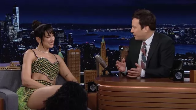 Area Green Wool Skirt and Tank Top worn by Dua Lipa as seen in The Tonight Show Starring Jimmy Fallon on March 22, 2022