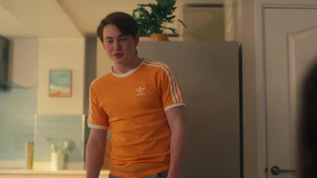 T-shirt Adidas Orange Trefoil porté par Nick Nelson (Kit Connor) vu dans la série télévisée Heartstopper (saison 1 épisode 8)