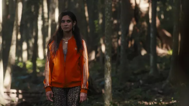 Adidas SST Track Jacket in orange worn by Fatin Jadmani (Sophia Taylor Ali) as seen in The Wilds TV series outfits (Season 2 Episode 3)