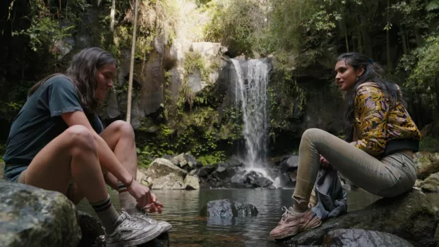 Nike M2K Tekno Pink Foam sneakers worn by Fatin Jadmani (Sophia Taylor Ali) as seen in The Wilds (S02E05)