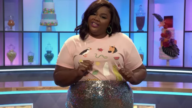 Lorien Stern Pink graphic t-shirt worn by Nicole Byer as seen in Nailed It! (S06E01)