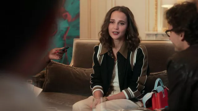 Louis Vuitton varsity jacket worn by Mira (Alicia Vikander) as seen in Irma  Vep TV series wardrobe (Season 1 Episode 1)