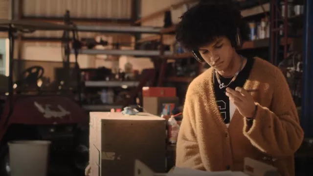 Saint Ramon Fuzzy Cardi­gan worn by Lino (Donovin Miller) as seen in Tom Swift (S01E04)