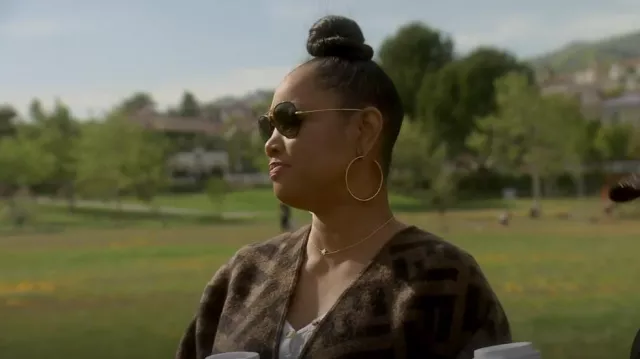 Fendi Pon­cho worn by Garcelle Beauvais as seen in The Real Housewives of Beverly Hills (S12E08)