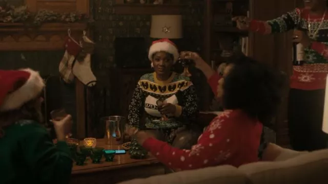 Costume Agent Wu Tang Clan Logo Ugly Christmas Sweater worn by Jada Washington (Yolonda Ross) as seen in The Chi (S05E03)