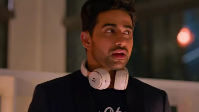 Beats headphones in white used by Ravi (Suraj Sharma) as seen in Wedding Season movie