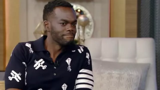 Thom Browne Sky Icons Intarsia Polo Shirt worn by William Jackson Harper as seen in LIVE with Kelly and Ryan on August 08,2022