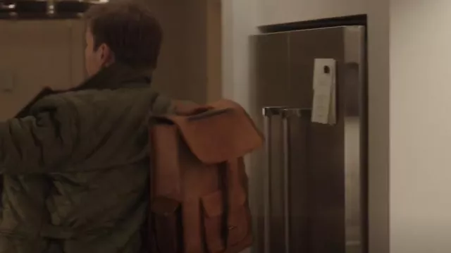 Brown leather backpack worn by Luke (Dan Amboyer) in Uncoupled TV series (S01E06)