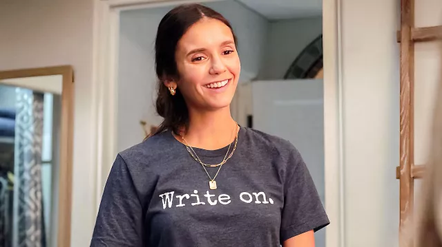"Write On." Graphic Tee worn by Natalie Bauer (Nina Dobrev) in Love Hard movie
