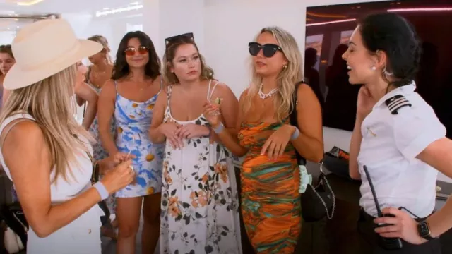 Indie Dream Floral Crisscross Spaghetti Strap High-Low Dress worn by Alex as seen in Below Deck Mediterranean (S07E10)