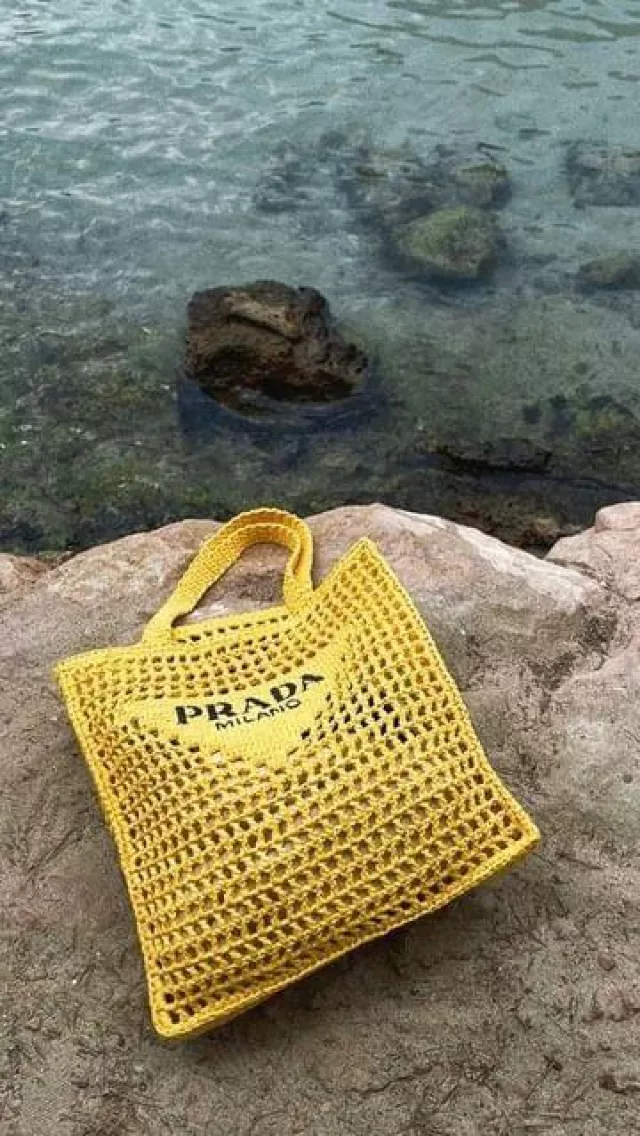 Maile's yellow Prada tote on his Instagram account @maileakln