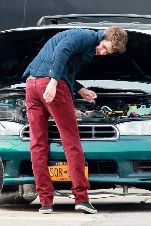 Red corduroy jeans worn by Andrew Garfield on the set of The Amazing Spider-Man 2 movie