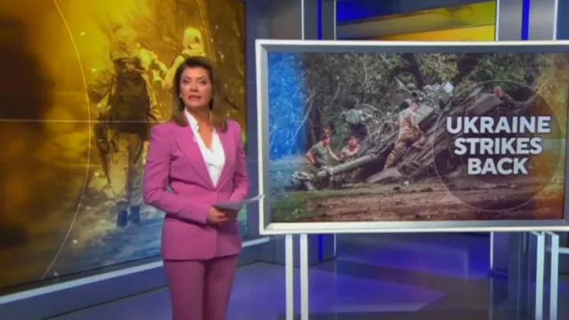 Michael Kors Wool Peak-Lapel Blazer worn by Norah O'Donnell as seen in CBS Evening News on October 3,2022