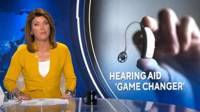 New York & Company Estelle Cardigan Eva Mendes Collection worn by Norah O'Donnell as seen in CBS Evening News on October 17, 2022