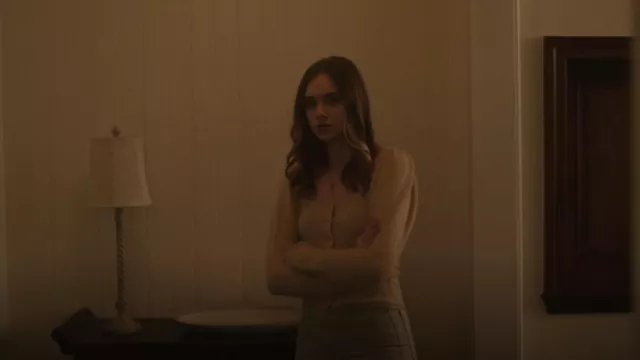 Urban Outfitters Ashley Puff Cardigan worn by Ellie Brannock (Isabel Gravitt) as seen in The Watcher (S01E06)