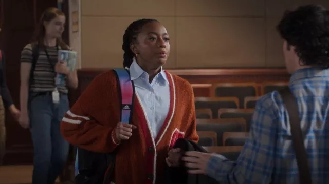 BP. Varsity Cardigan Rust Ivory Prep worn by Whitney Chase (Alyah Chanelle Scott) as seen in The Sex Lives of College Girls (S02E05)