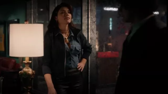 Saint Laurent Den­im Body­suit worn by Nadia Morales (Eva De Dominici) as seen in The Cleaning Lady (S02E10)