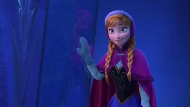 Le manteau d'hiver violet porté par Anna (Kristen Bell) dans le film d'animation La reine des neiges