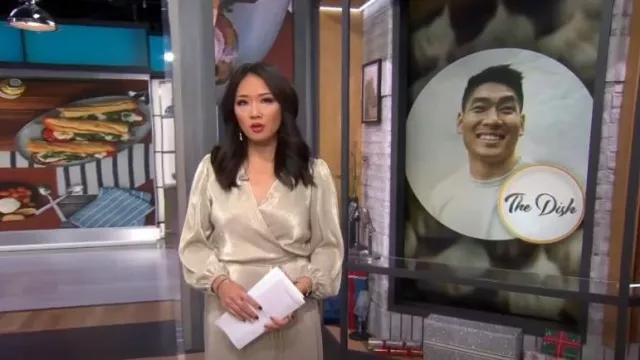 Ann Taylor Shimmer Pleated Wrap Dress worn by Nancy Chen as seen in CBS Mornings on December 11, 2022
